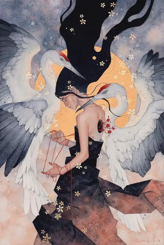 A woman in a dark dress sits with her back to the viewer, holding red strings that appear to control two large white cranes…