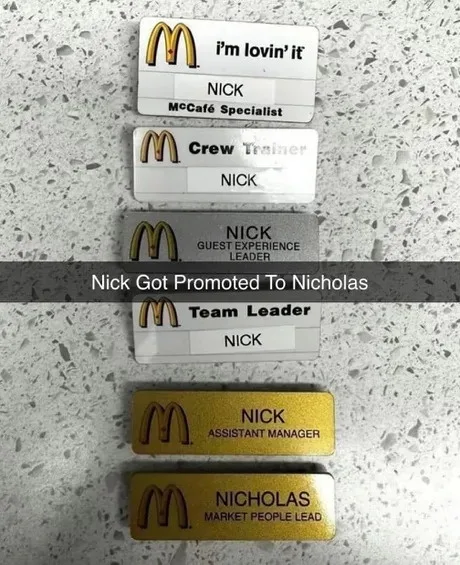 Five McDonald's employee name badges are stacked vertically on a speckled countertop, showing a progression from 'McCafé…