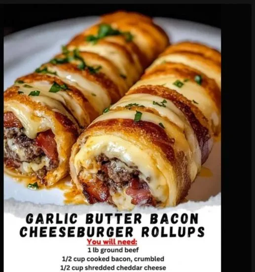 A close-up photo of several golden-brown, cheesy, bacon-wrapped rollups filled with ground beef and melted cheese, garnished…