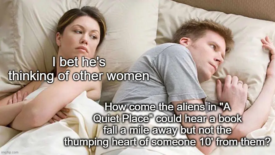 A man and woman lie in bed, the woman looking annoyed with text overlay 'I bet he's thinking of other women', while the man…