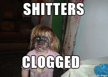 A young girl with dark, smudged makeup covering her face, wearing a pink shirt, is shown in a dimly lit room with furniture…