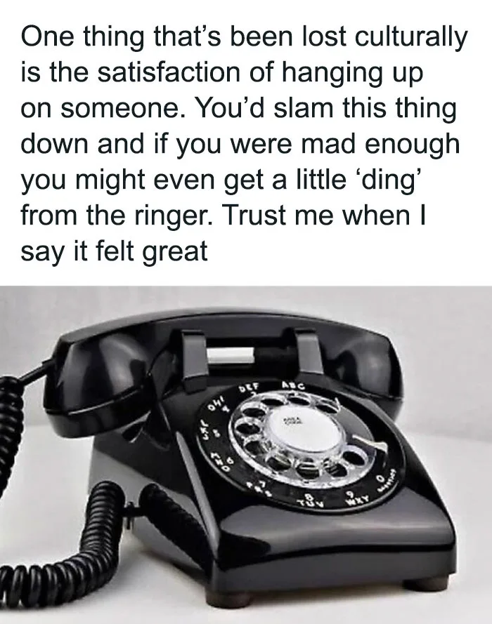 A black rotary telephone with a coiled cord is shown against a plain background. Overlaid text nostalgically describes the…