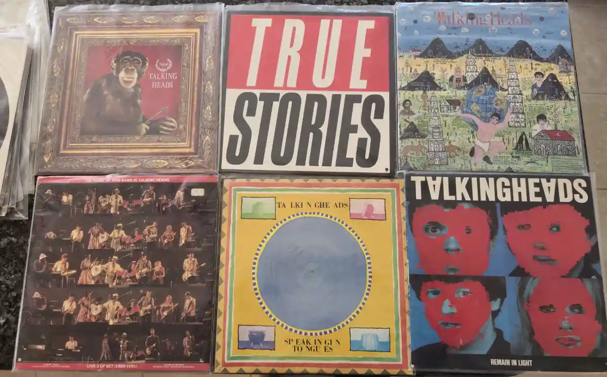 Six Talking Heads album covers are displayed in a grid, including 'Naked', 'True Stories', 'Fear of Music', 'Live 2 LP Set'…