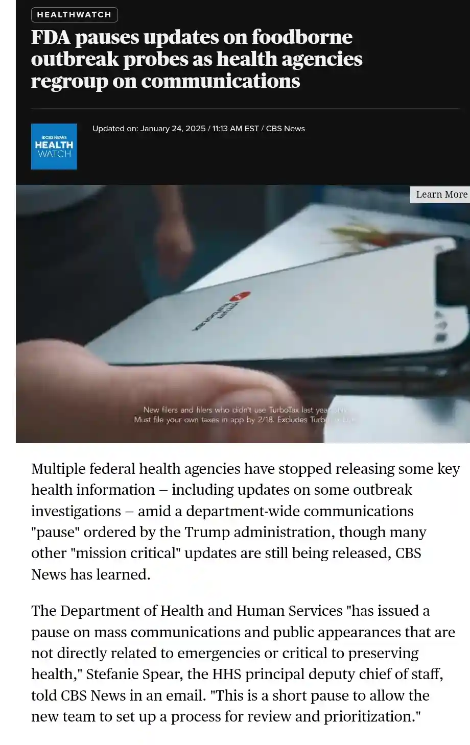 A screenshot of a CBS News HealthWatch article about the FDA pausing outbreak updates, overlaid with a photo of a hand…