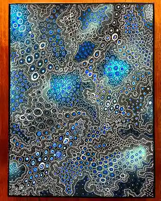 A framed abstract painting featuring intricate patterns of concentric circles in shades of blue, white, and black…