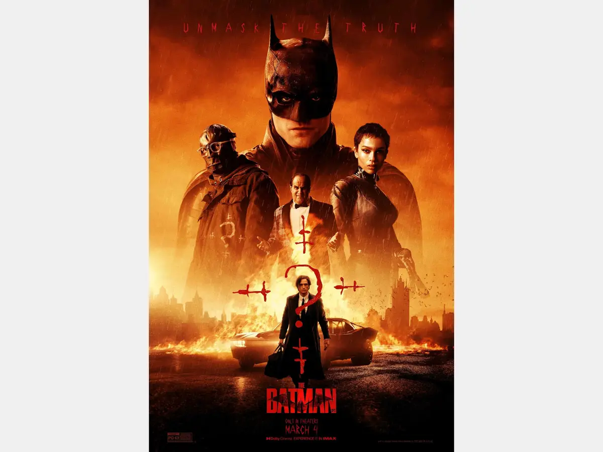 The movie poster for 'The Batman' features Batman prominently in the center, flanked by Catwoman, The Riddler, and Two-Face…