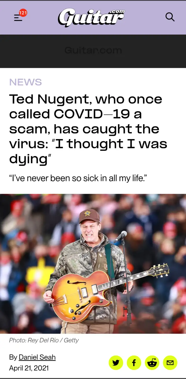 A screenshot of a Guitar.com news article from April 2021 shows musician Ted Nugent holding a guitar on stage, wearing a…