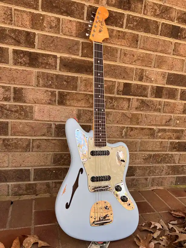 Check out this stunning Rosser/Fender Japan Thinline Jaguar guitar!