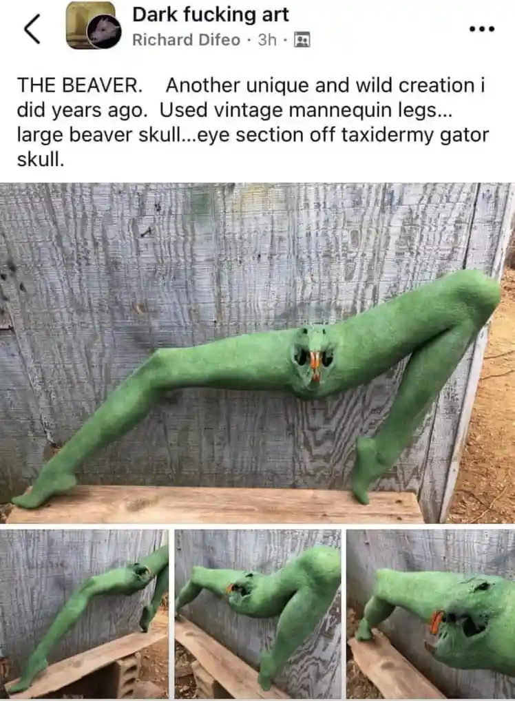 A green, humanoid sculpture with a beaver skull for a head and gator eye sockets, posed in a yoga-like stretch on a wooden…