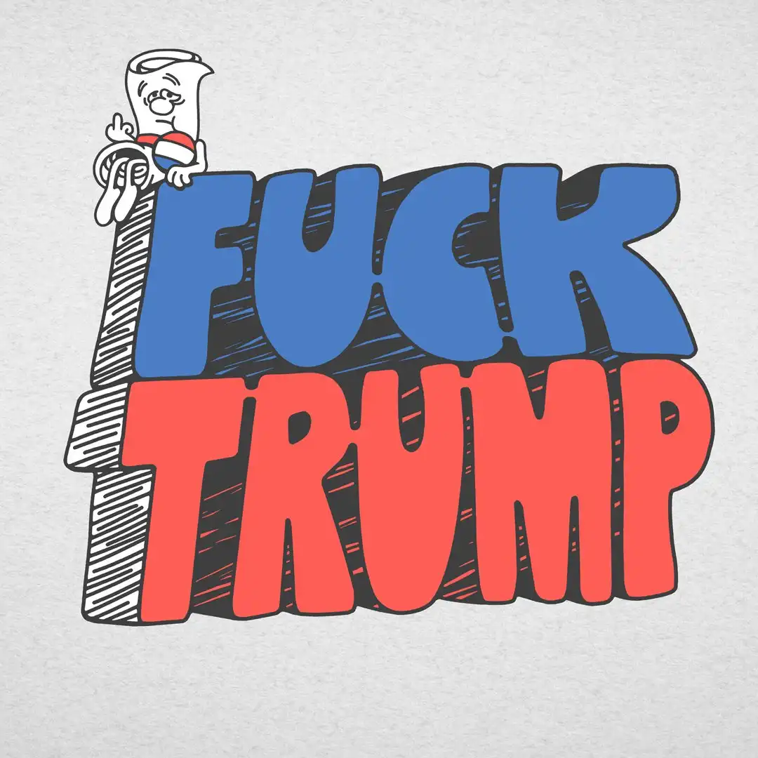 A graphic design on a light gray t-shirt features the words 'FUCK TRUMP' in large, bold, stylized letters — 'FUCK' in blue…