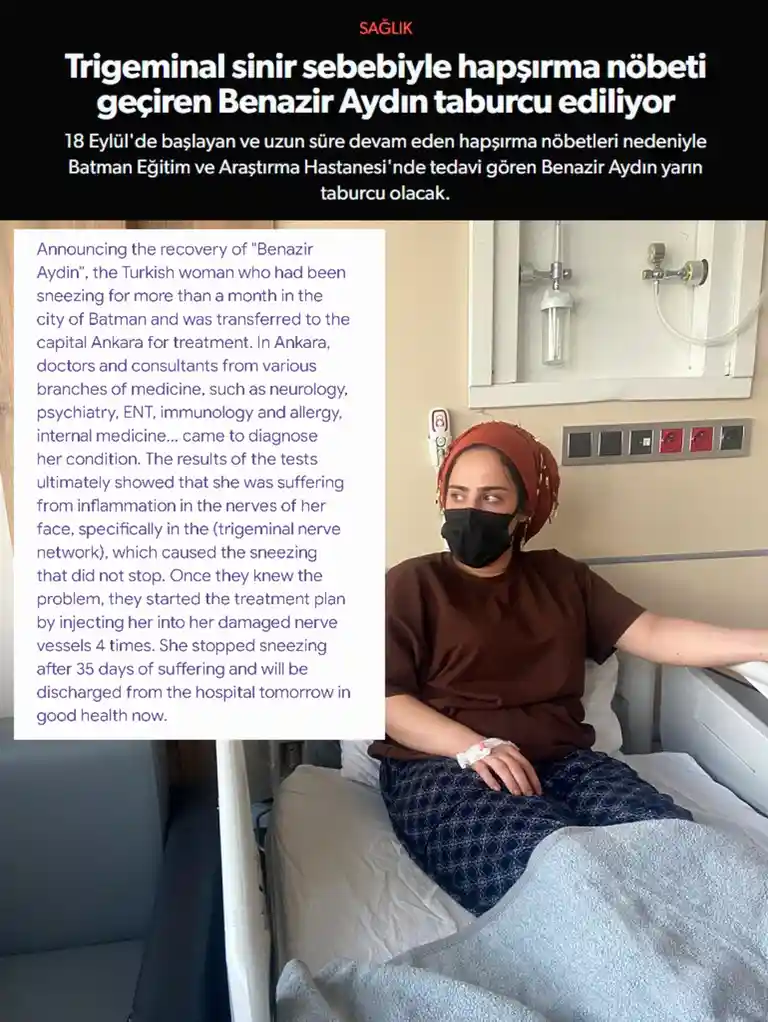 A woman in a hospital bed wearing a black face mask and a red headscarf, with a white bandage on her wrist. The image is…