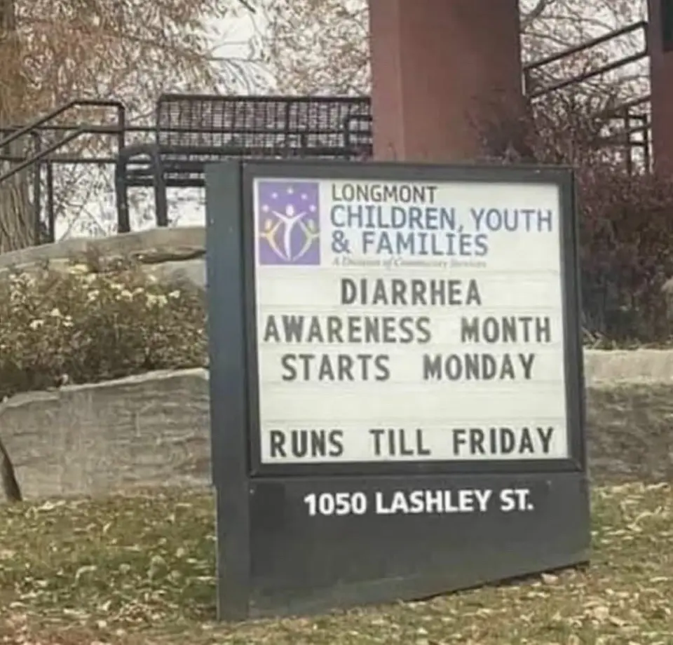 An outdoor sign for Longmont Children, Youth & Families announces 'DIARRHEA AWARENESS MONTH STARTS MONDAY RUNS TILL FRIDAY'…