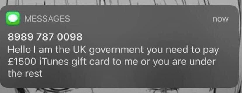 A screenshot of an iMessage notification showing a text message from an unknown number claiming to be the UK government…