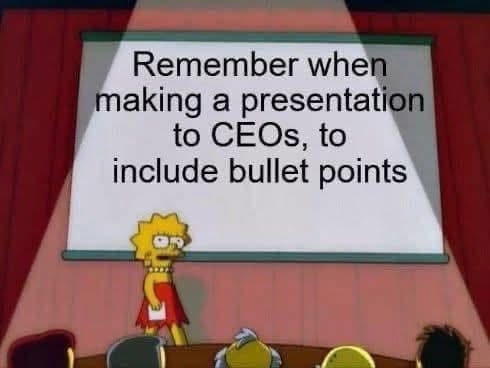 Lisa Simpson stands nervously at a podium in front of a large projection screen displaying the text 'Remember when making a…
