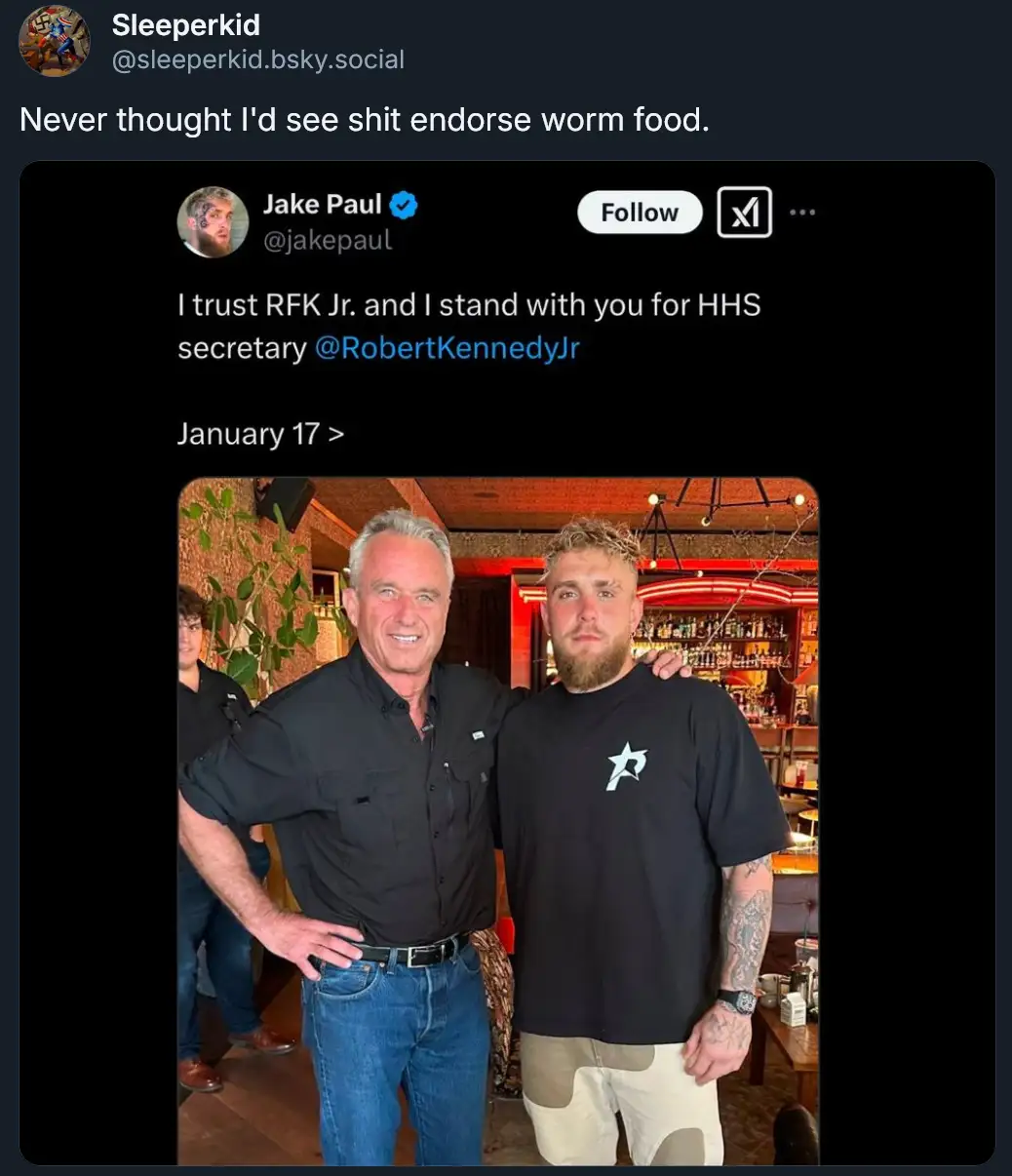 A screenshot of a social media post by Jake Paul, who is pictured with Robert F. Kennedy Jr. in a bar setting. The post…
