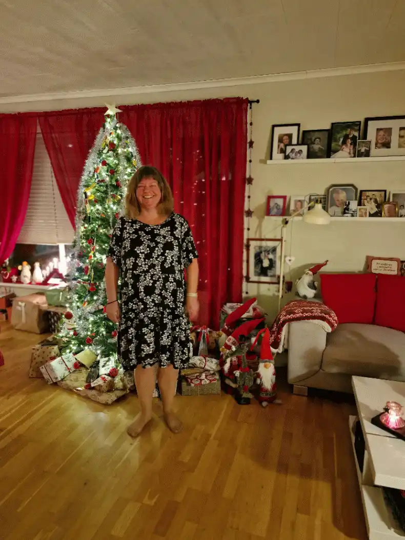 a six-panel grid shows a person in a christmas-themed living room, starting dressed formally and progressively getting more…