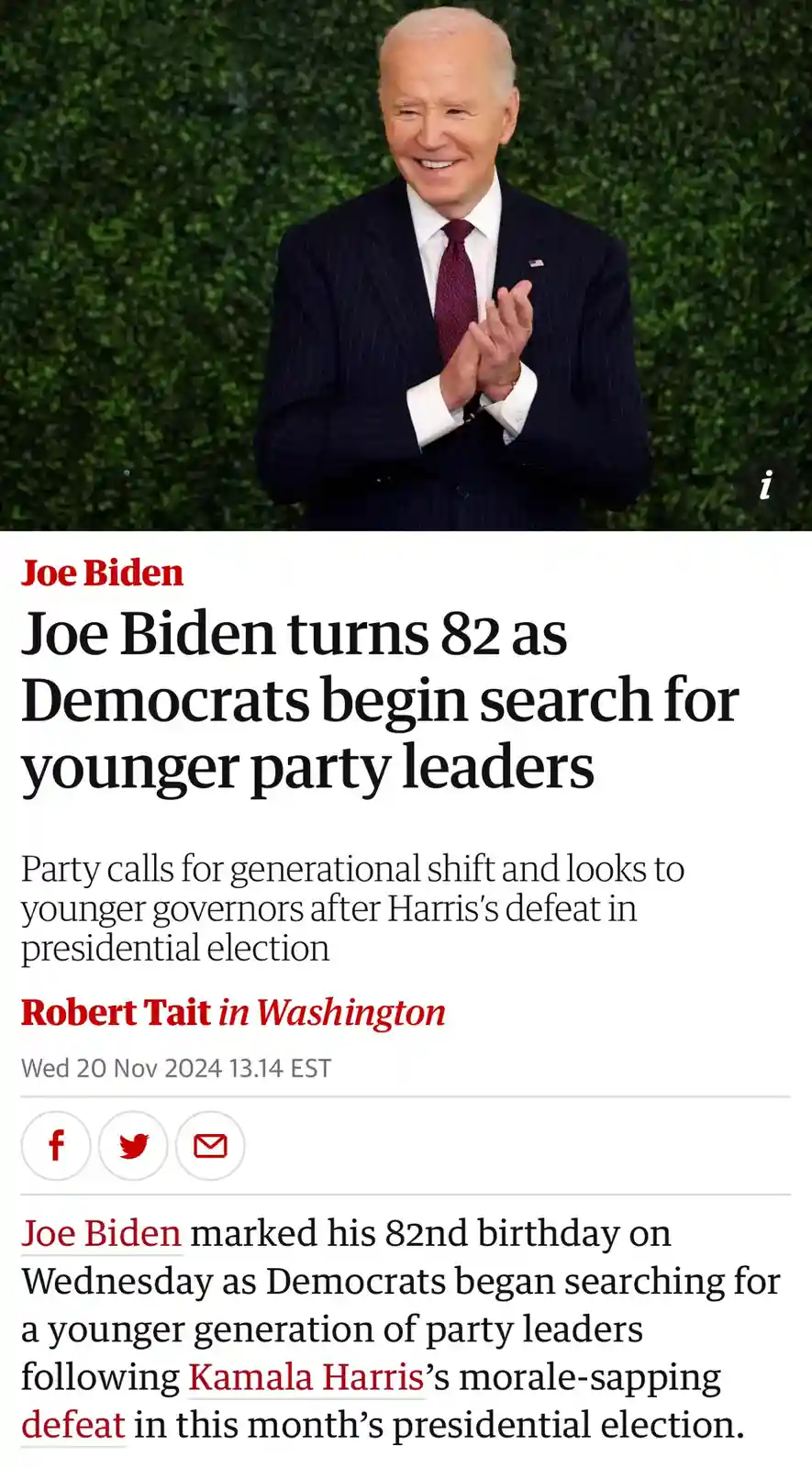 A screenshot of a news article shows a smiling Joe Biden in a dark pinstripe suit clapping against a green hedge background…