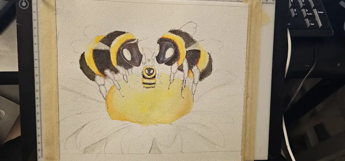 A watercolor drawing on textured paper shows a cartoonish bee with large, expressive eyes and a small body, sitting atop a…