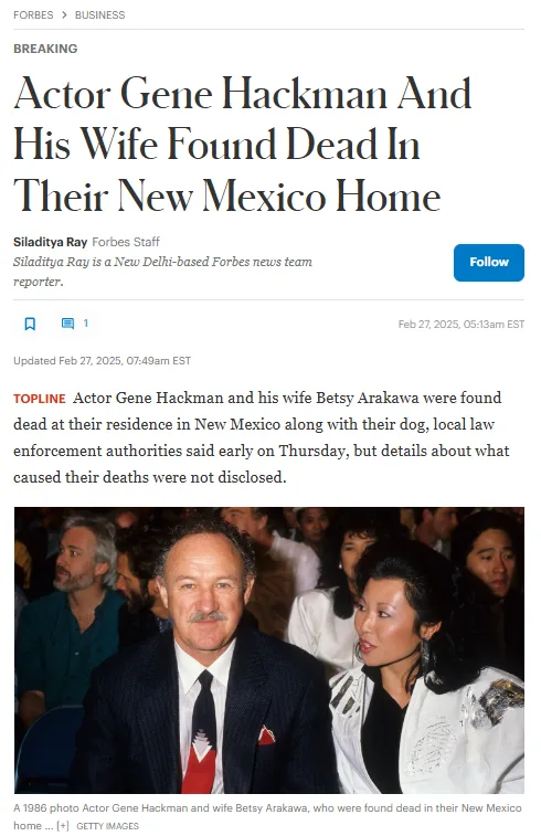 A 1986 photo shows actor Gene Hackman and his wife Betsy Arakawa seated together at an event, with Hackman in a dark suit…