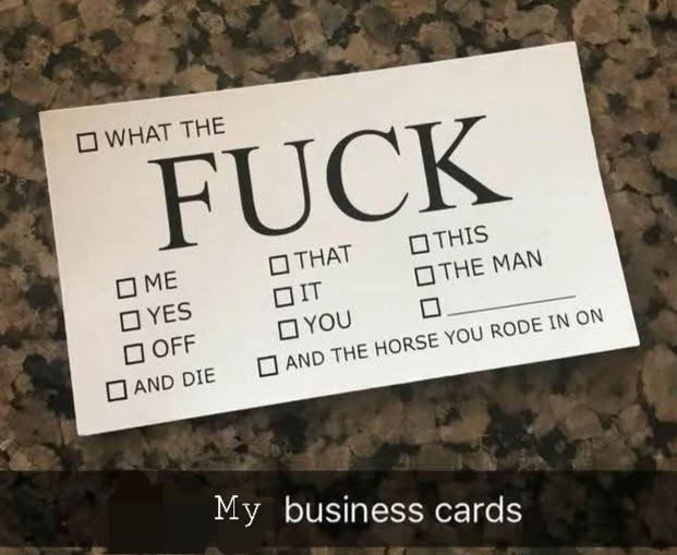 A white card on a granite countertop reads 'WHAT THE FUCK' in large font, with checkboxes below listing options like 'ME'…