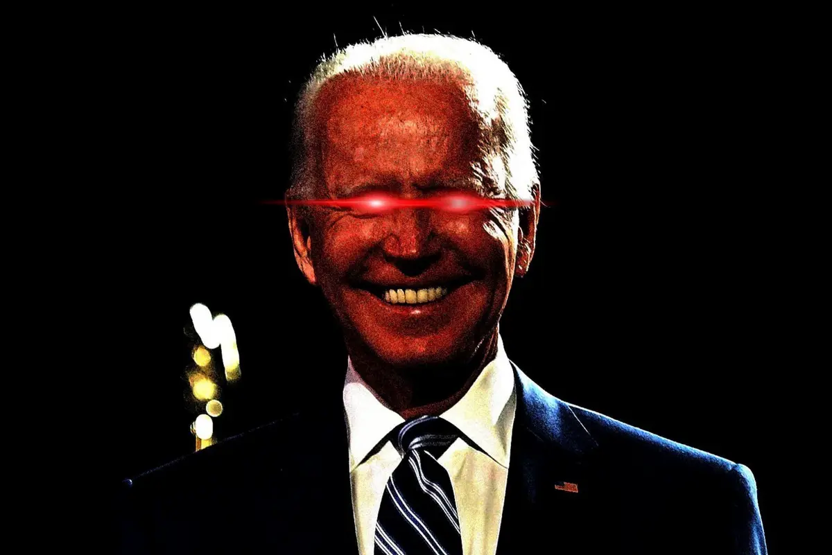A digitally altered image of Joe Biden smiling, with red laser beams edited to appear emanating from his eyes, set against a…
