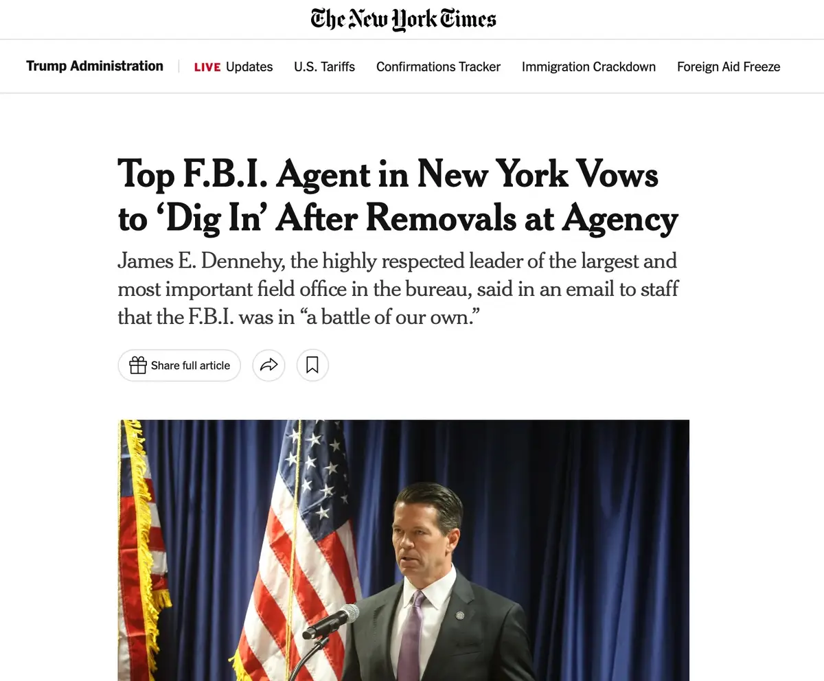 A screenshot of a New York Times article about F.B.I. agent James E. Dennehy, who is shown speaking at a podium in front of…