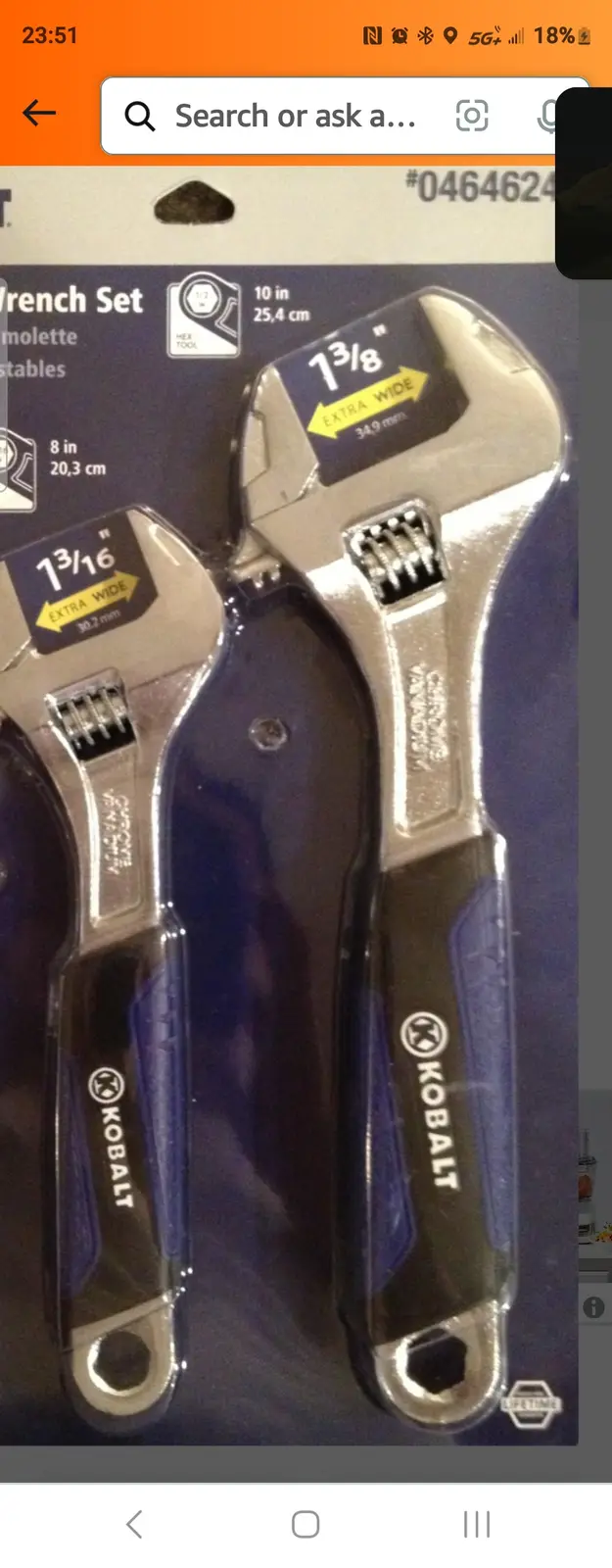 Two Kobalt brand adjustable wrenches in their retail packaging, one labeled 1 3/8" extra wide (34.9 mm) and the other 1…