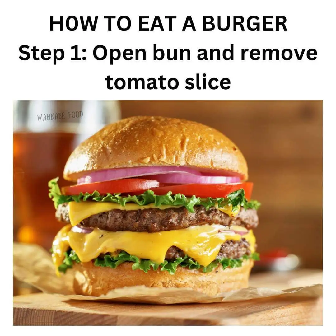 A close-up photo of a double cheeseburger with melted cheese, beef patties, lettuce, tomato, and onion slices between…