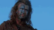 A sequence of six stills from the movie 'Braveheart' shows William Wallace, a Scottish warrior with blue face paint, in…