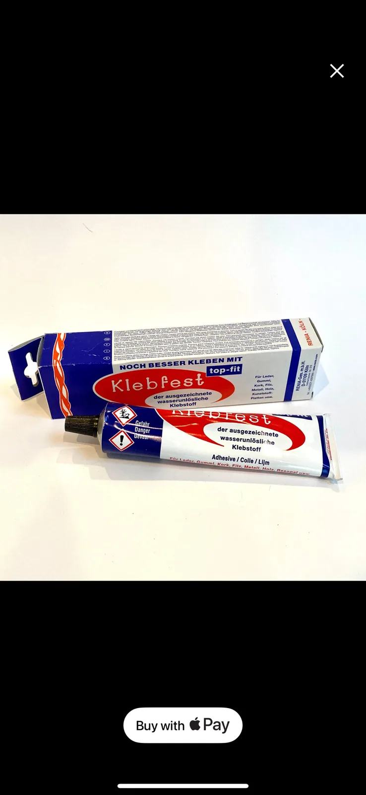 A tube and box of Klebfest brand water-resistant adhesive are shown on a white surface, with a 'Buy with Apple Pay' button…