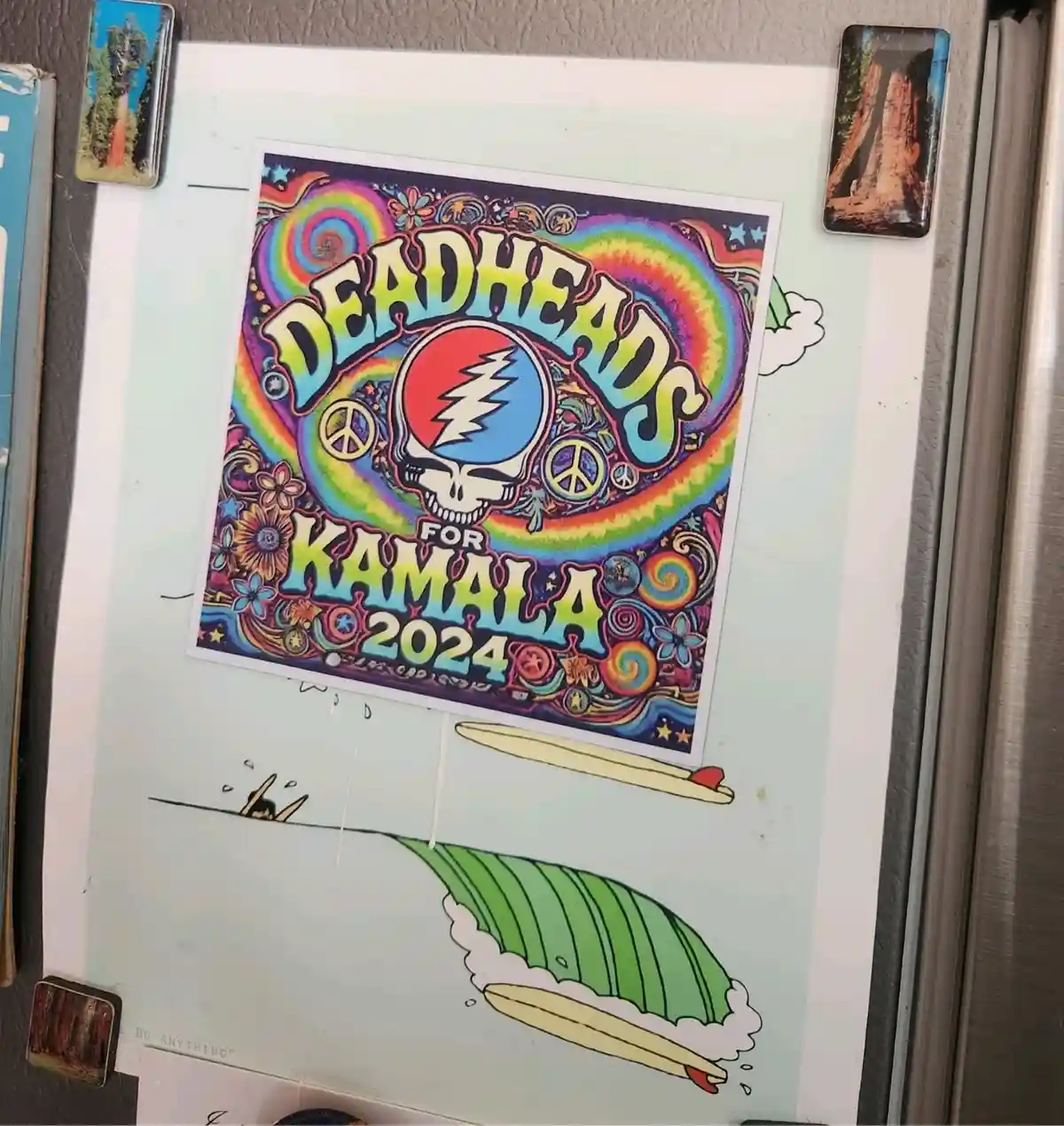 A colorful, psychedelic poster featuring the Grateful Dead's iconic skull and lightning bolt logo, with the text 'DEADHEADS…
