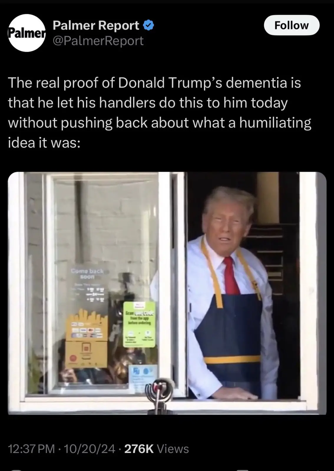 A screenshot of a Twitter post by Palmer Report showing Donald Trump wearing a dark blue and yellow apron over a white shirt…