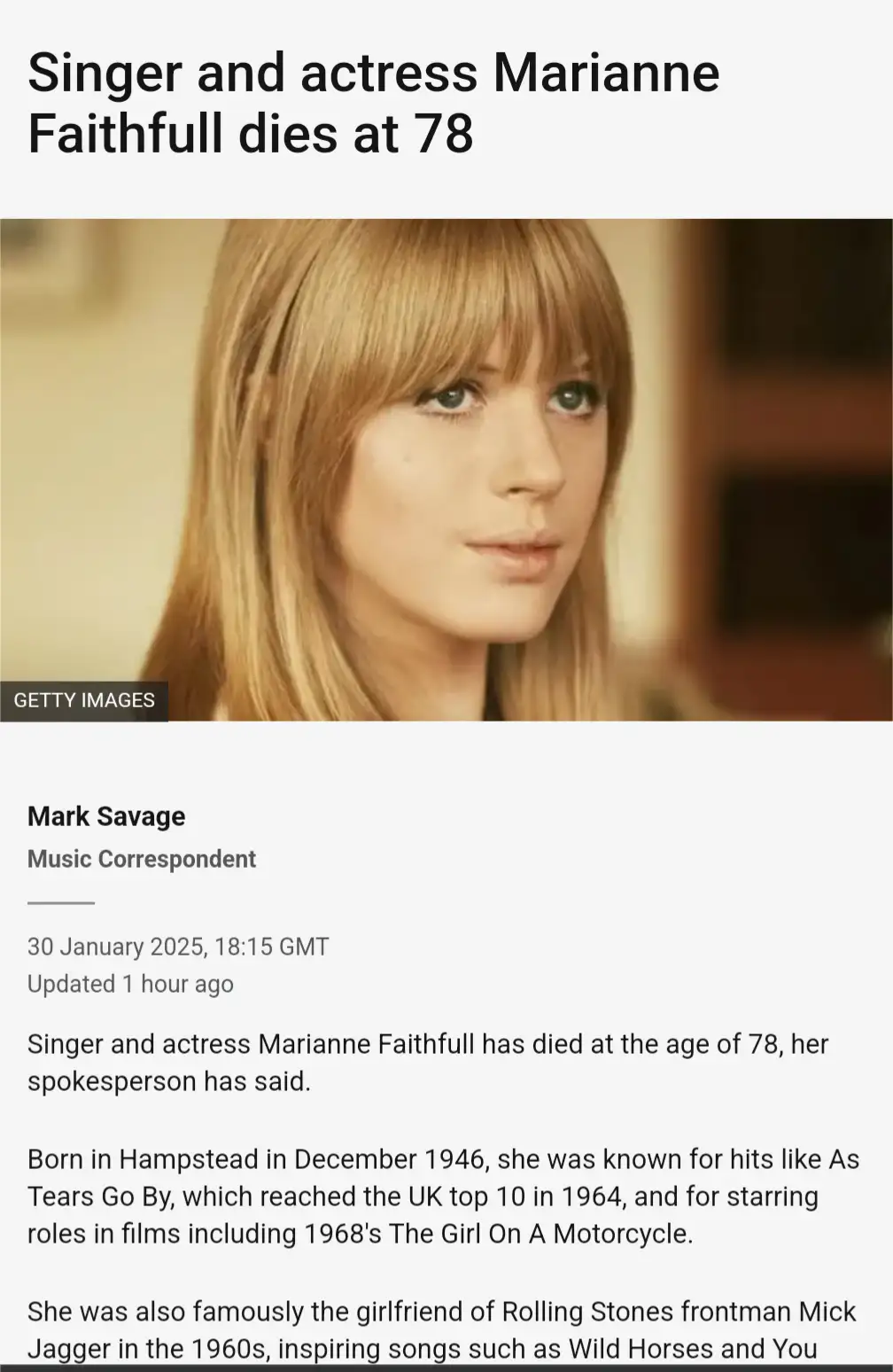 The image displays a news article snippet with a photo of Marianne Faithfull, a woman with blonde hair and bangs, looking…