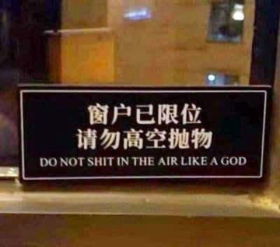 A black sign with white Chinese characters and English text is affixed to a window frame. The Chinese reads '窗户已限位 请勿高空抛物'…