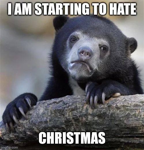 A black bear with a sad, disappointed facial expression rests its paws on a log. Large white text overlaid on the image…