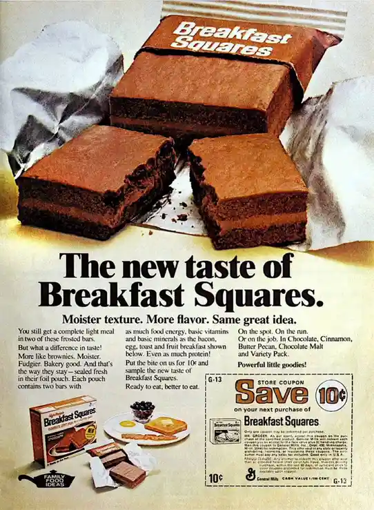 An old General Mills advertisement for 'Breakfast Squares' shows a large, sliced chocolate bar with a creamy filling…