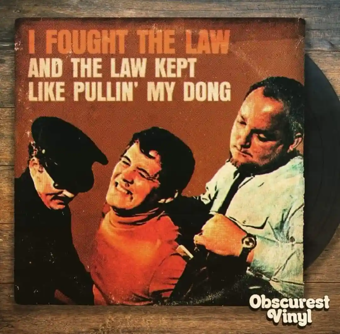 An album cover parody showing three men, one in a police uniform, one laughing, and one looking stern, with the text 'I…