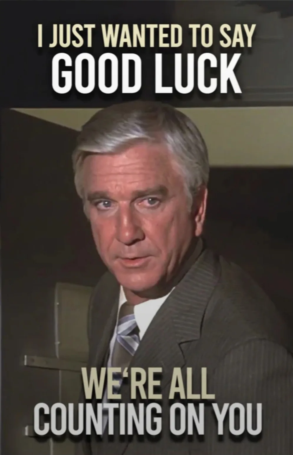 A still image of a man in a suit and tie with a serious, intense expression, overlaid with the text 'I JUST WANTED TO SAY…