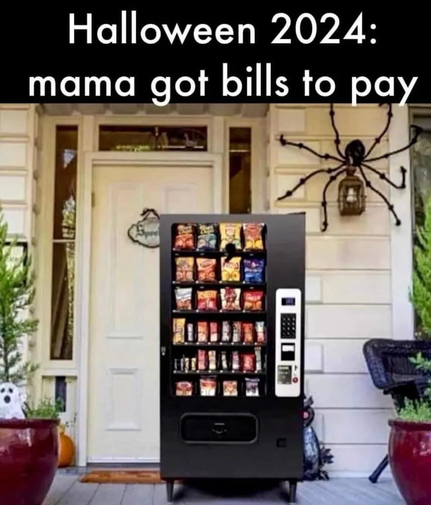 A black vending machine filled with snacks and drinks is placed on a front porch in front of a white door. The porch is…