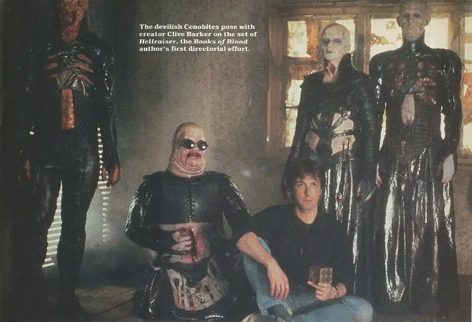 A vintage behind-the-scenes photo from the 1987 film 'Hellraiser' shows director Clive Barker sitting casually in jeans…