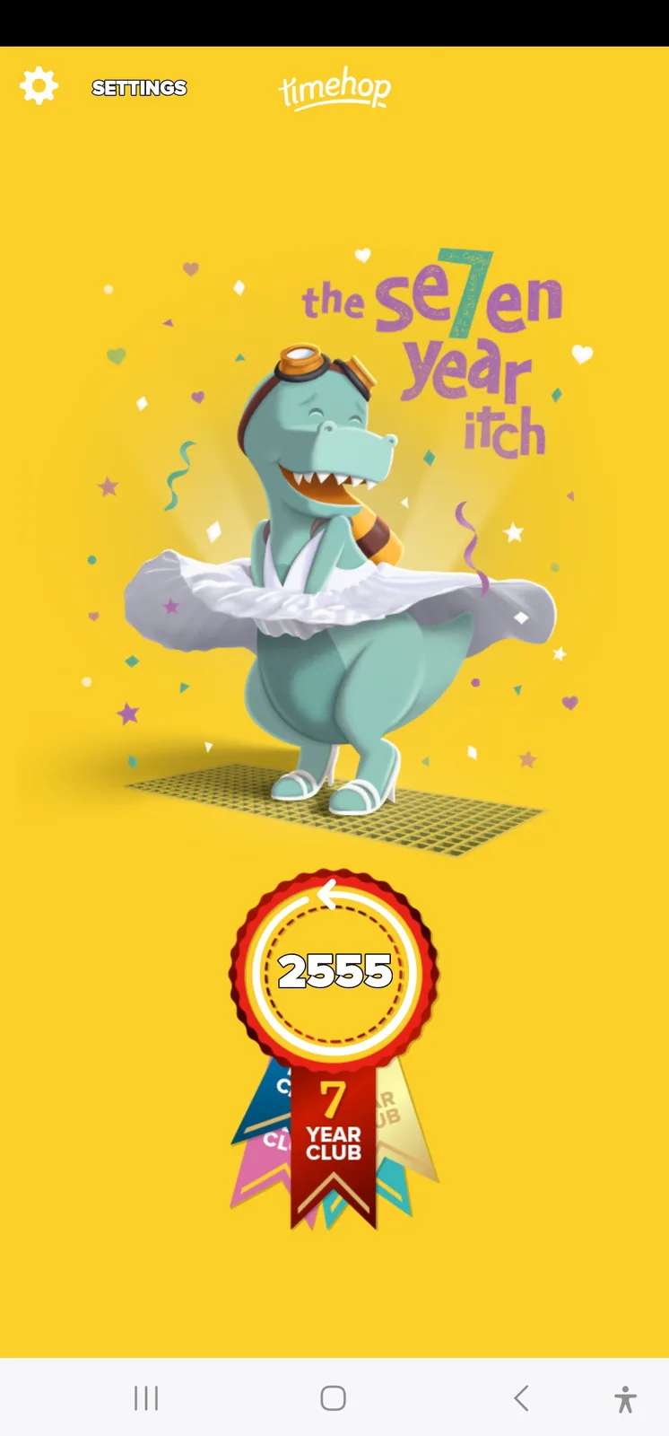 A cartoonish teal dinosaur wearing aviator goggles, a white tutu, and white high heels is dancing on a green grid floor…