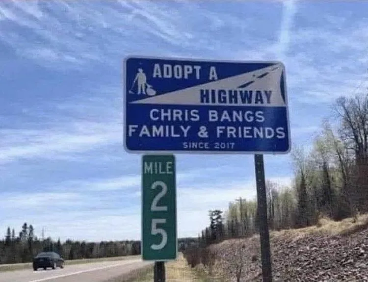 A blue 'Adopt a Highway' sign with a white silhouette of a person cleaning, customized to read 'CHRIS BANGS FAMILY & FRIENDS…