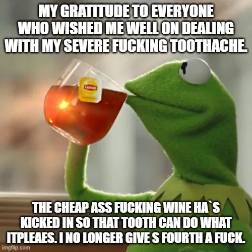 A green frog character, Kermit the Frog, is shown holding a glass of red tea with a Lipton tag, sipping it while looking…