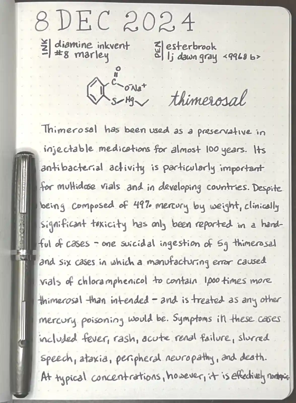 A handwritten note in a dotted notebook dated 8 DEC 2024, detailing the chemical structure and medical use of thimerosal, a…