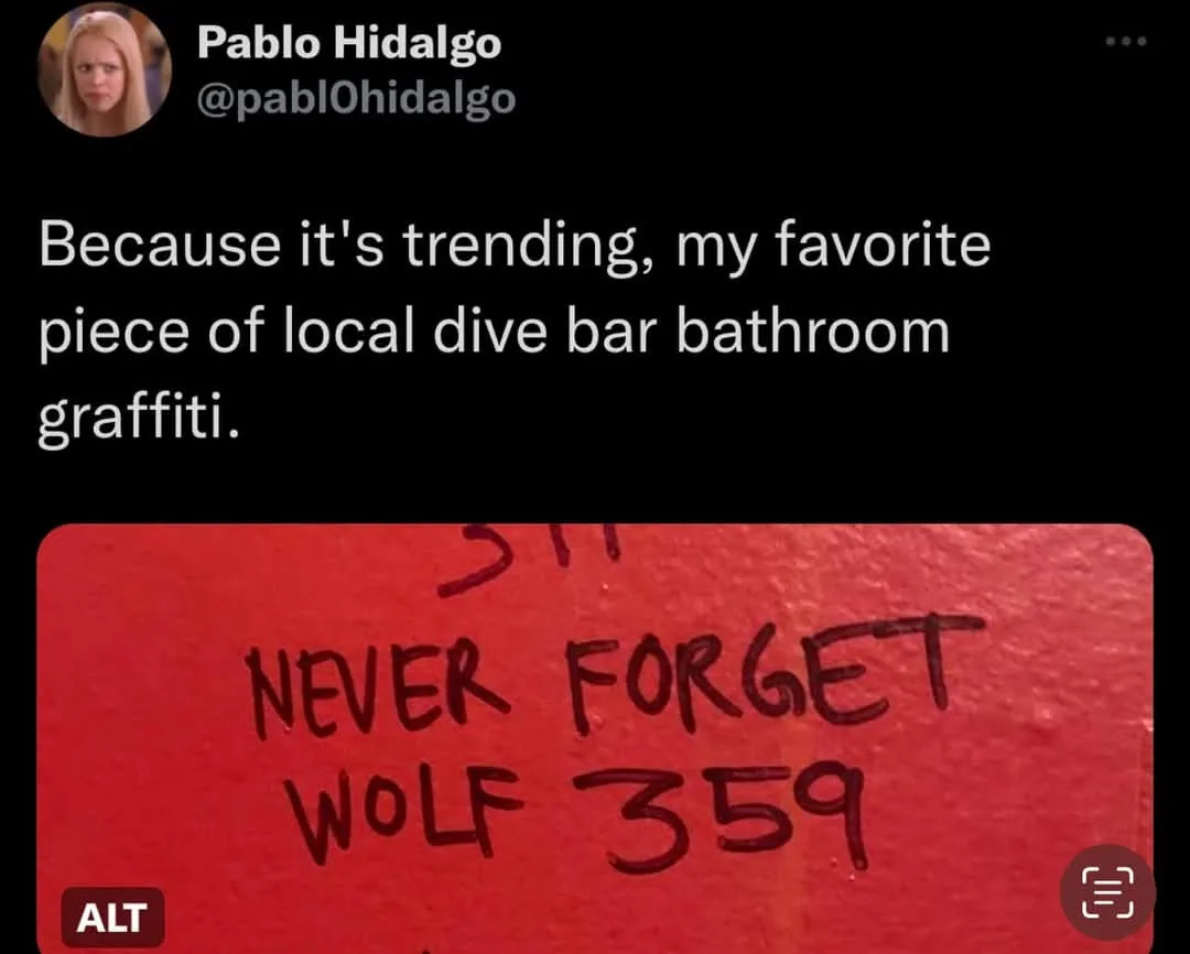 A screenshot of a tweet by Pablo Hidalgo showing a red wall with handwritten graffiti that reads 'NEVER FORGET WOLF 359'…