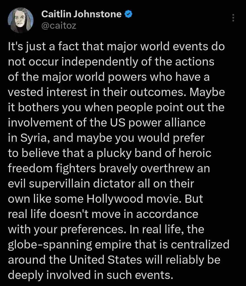 A screenshot of a tweet by Caitlin Johnstone (@caitoz) with a black background and white text. The tweet argues that major…