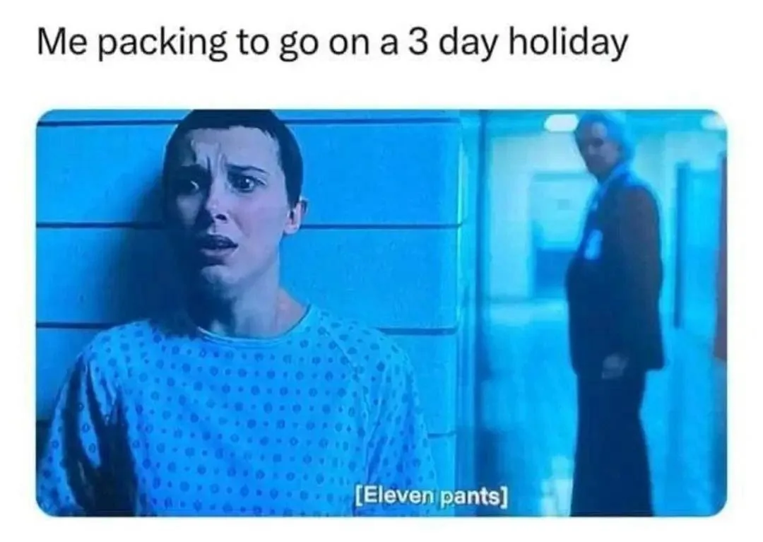 A still from the TV show 'Stranger Things' shows Eleven in a hospital gown, looking panicked and overwhelmed, with a blurred…