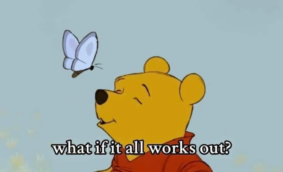 A cartoon image of Winnie the Pooh looking up with a hopeful, serene expression as a white butterfly flies near his face…