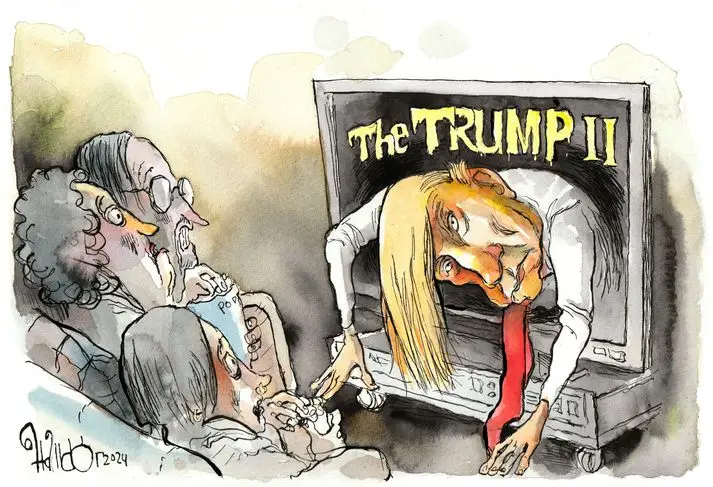 A cartoon depicts a man with glasses and a beard watching a TV screen that shows a distorted, exaggerated caricature of…