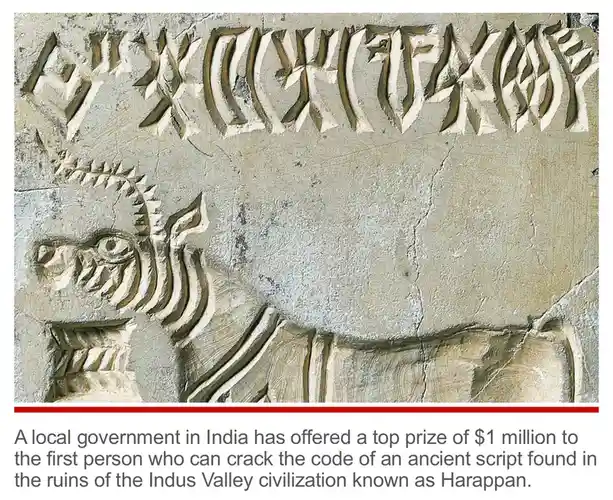 The image shows a close-up of an ancient stone carving featuring a stylized animal, likely a bull or zebu, with a row of…